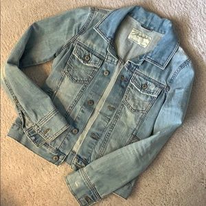 Distressed denim jacket